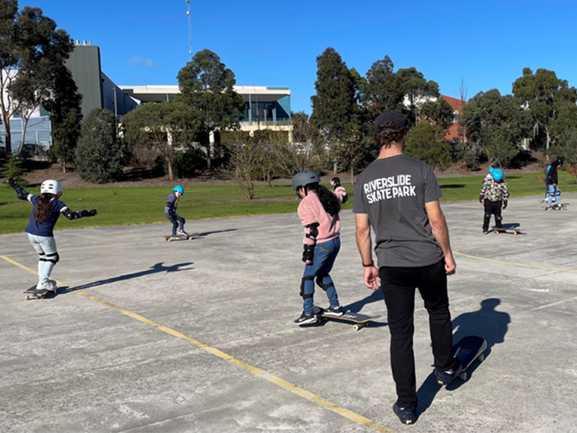 The Y Open Doors skateboarding event with Kenley Court kids