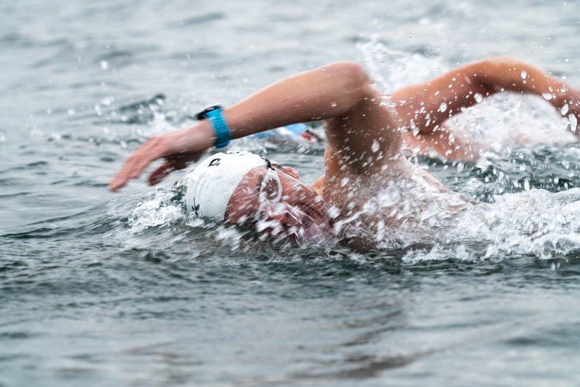 Action shot of Anton Ilchenko swimming in open water
