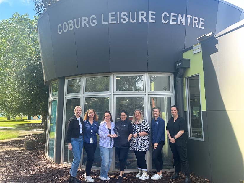 Coburg Leisure Centre staff members posing at the front of building