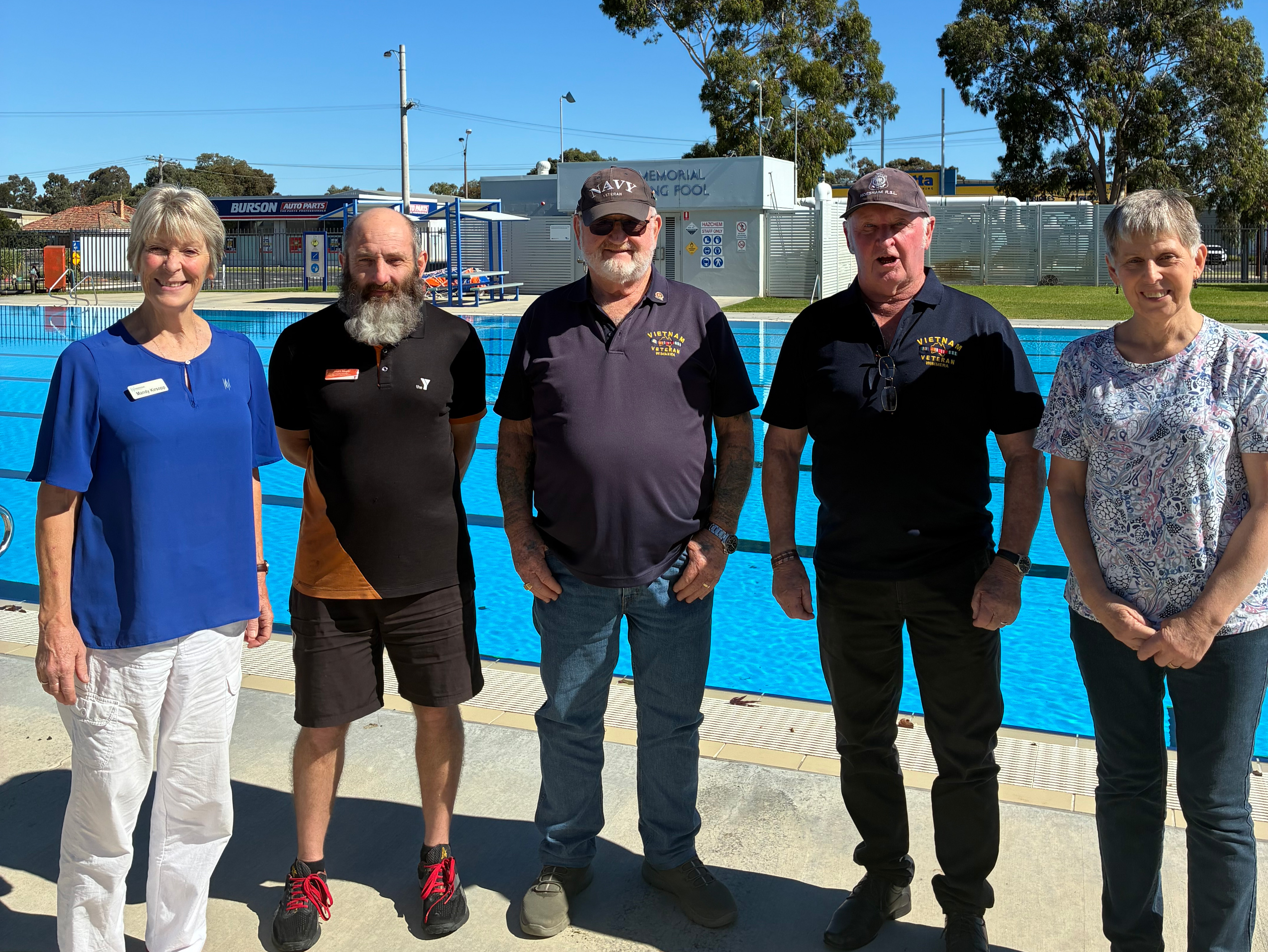 Community members stood in front of the Horsham War Memorial outdoor pool