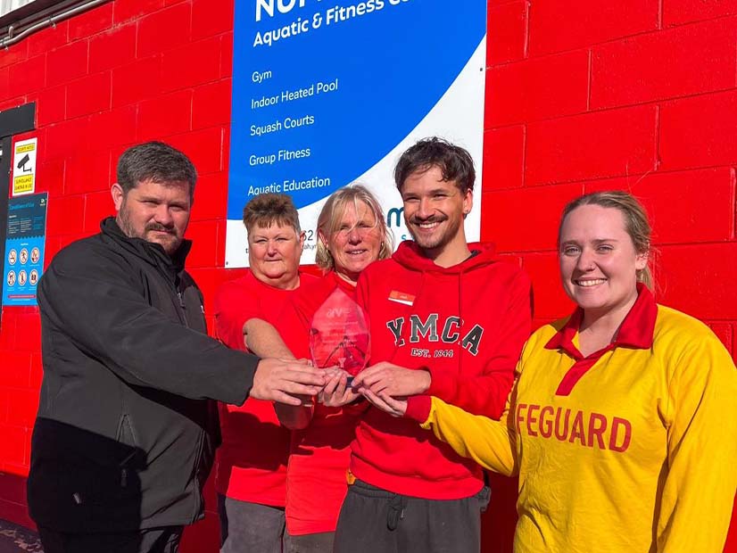Numurkah Aquatic Fitness Centre staff holding award outside of centre