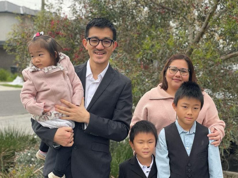 Sam Chew stands with his three children and friend Kashmira Bhathena.