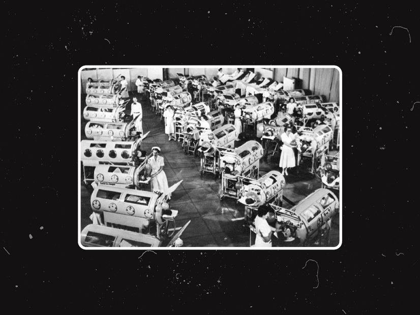 Children with polio receive treatment in an iron lung facility, 1950's